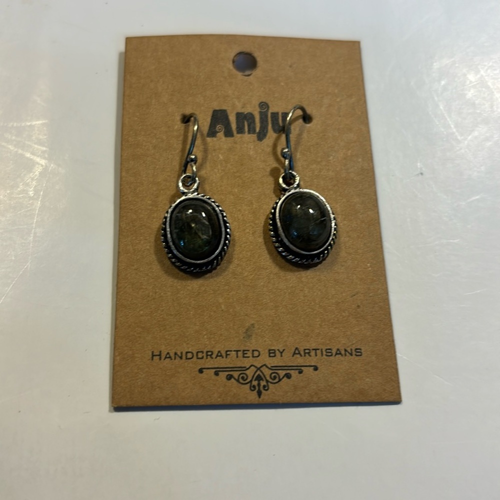 Anju handcrafted drop fishback earrings silver color with greenish gem stones